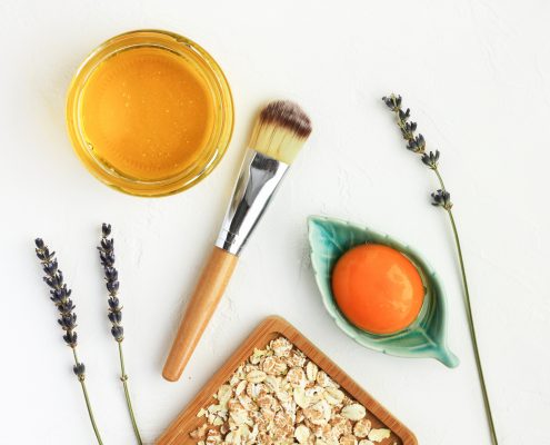 Nourishing skin care natural treatment, facial mask with egg yolk, honey, oat flakes,